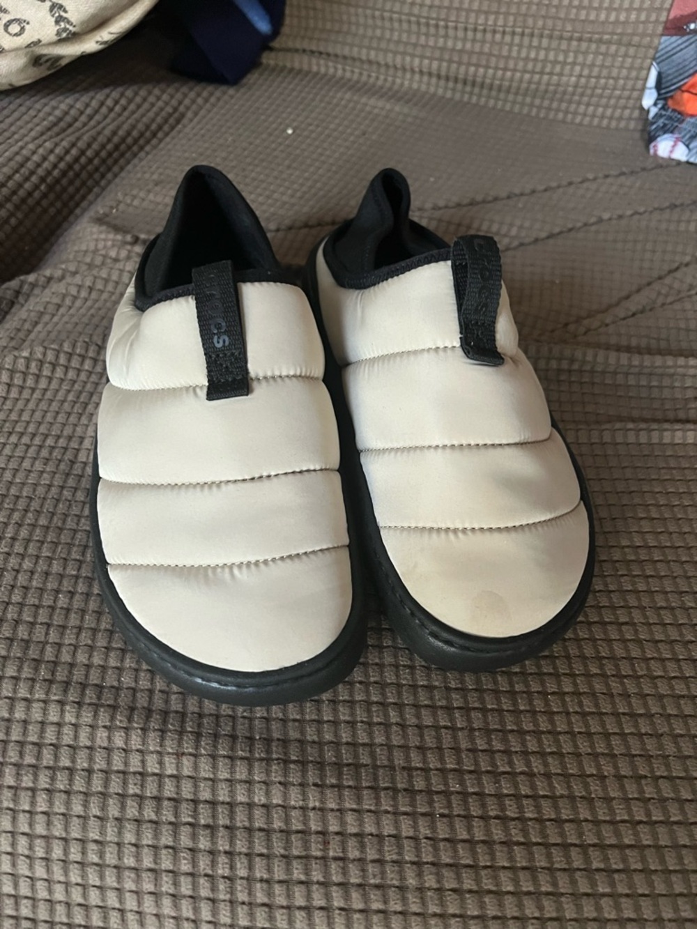 CROCS Kids Quilted Puff Slip-Ons in Cream and Black